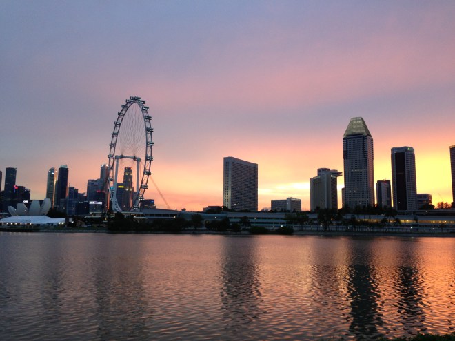 singapore flyer skyline sunset gardens by the bay