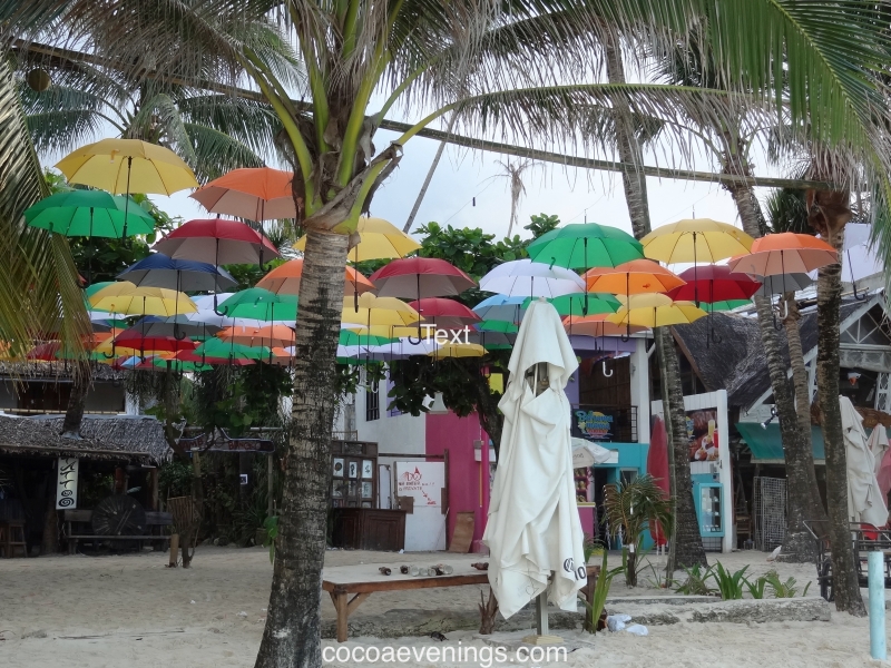 white-cape-under-umbrella-bali-DSC01341